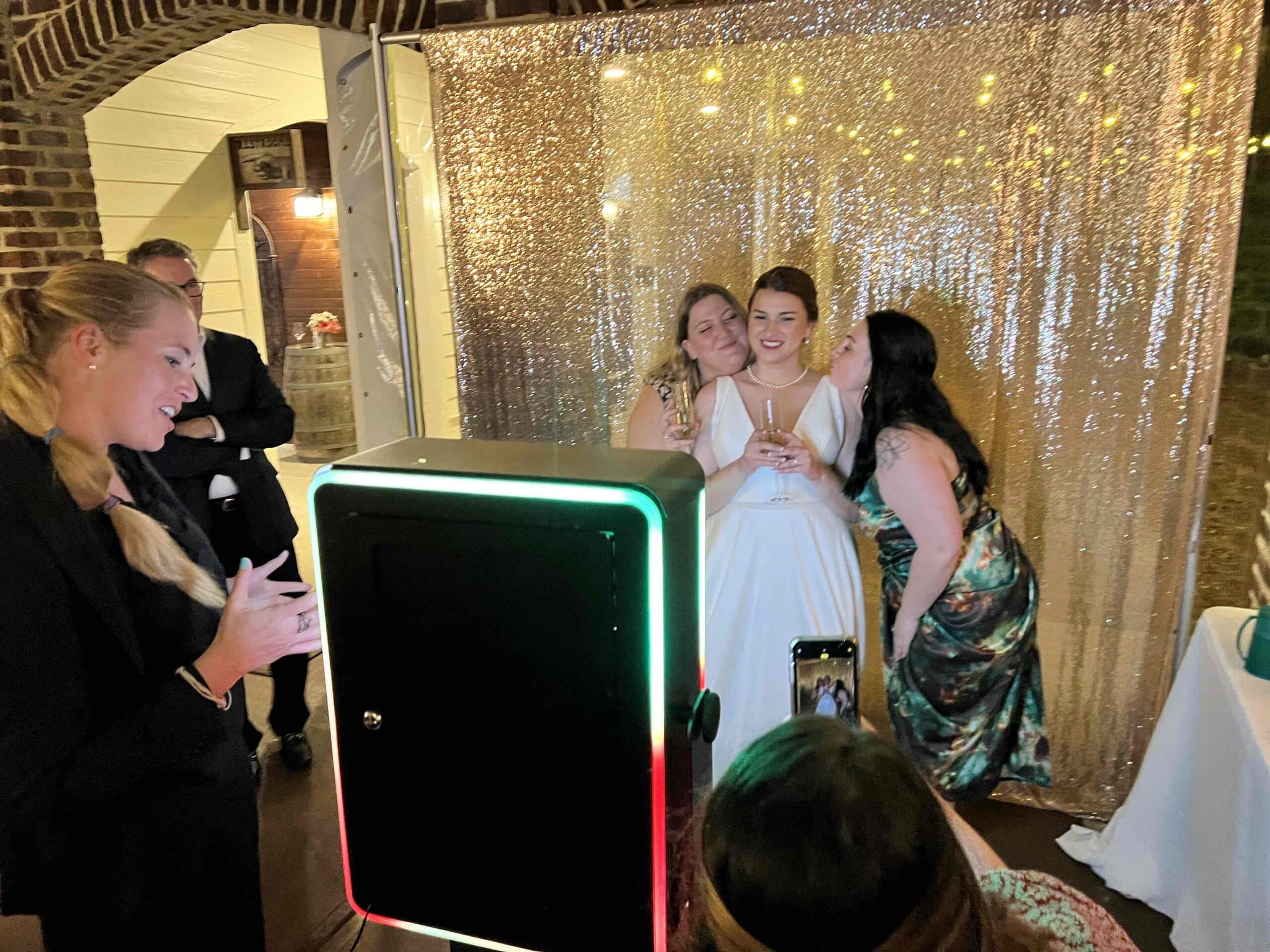 Summer_Wedding_-_Summer_Wedding_DJ_Ceremony_Cocktail_Reception_Photo_Booth_and_lighting_-_Oaks_at_Salem_in_Apex_NC_Bridal_Photo_Booth_with_Guests_2 - Stylus Weddings Stylus SE -Summer Wedding - DJ Photo Booth and Lighting - Oaks at Salem in Apex, NC