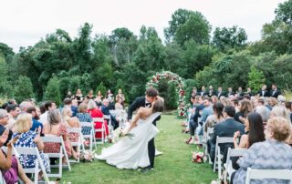 couple having their first kiss at the Maxwell - Stylus Wedding DJs - Wedding at the Maxwell in Raleigh North Carolina