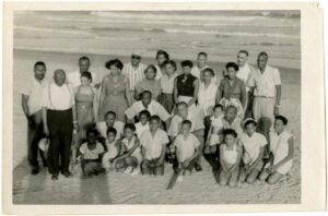 Vintage beach scene at historic Atlantic Beach, South Carolina, showing Black vacationers during the mid-20th-century resort era.