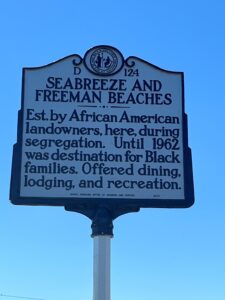Seabreeze and Freeman Beaches historical marker near Carolina Beach, North Carolina, honoring historic Black beach resorts and entertainment communities.
