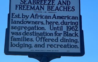 Seabreeze and Freeman Beaches historical marker near Carolina Beach, North Carolina, honoring historic Black beach resorts and entertainment communities.