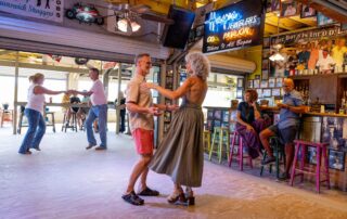 For decades, the Myrtle Beach Pavilion stood at the center of the Grand Strand’s entertainment culture, surrounded by the clubs, dance floors, arcades, and nightlife that helped make Myrtle Beach synonymous with Carolina Beach Music and the shag. This picture of couples swing dancing is indicative of how the legacy of beach music lives on in the Carolinas
